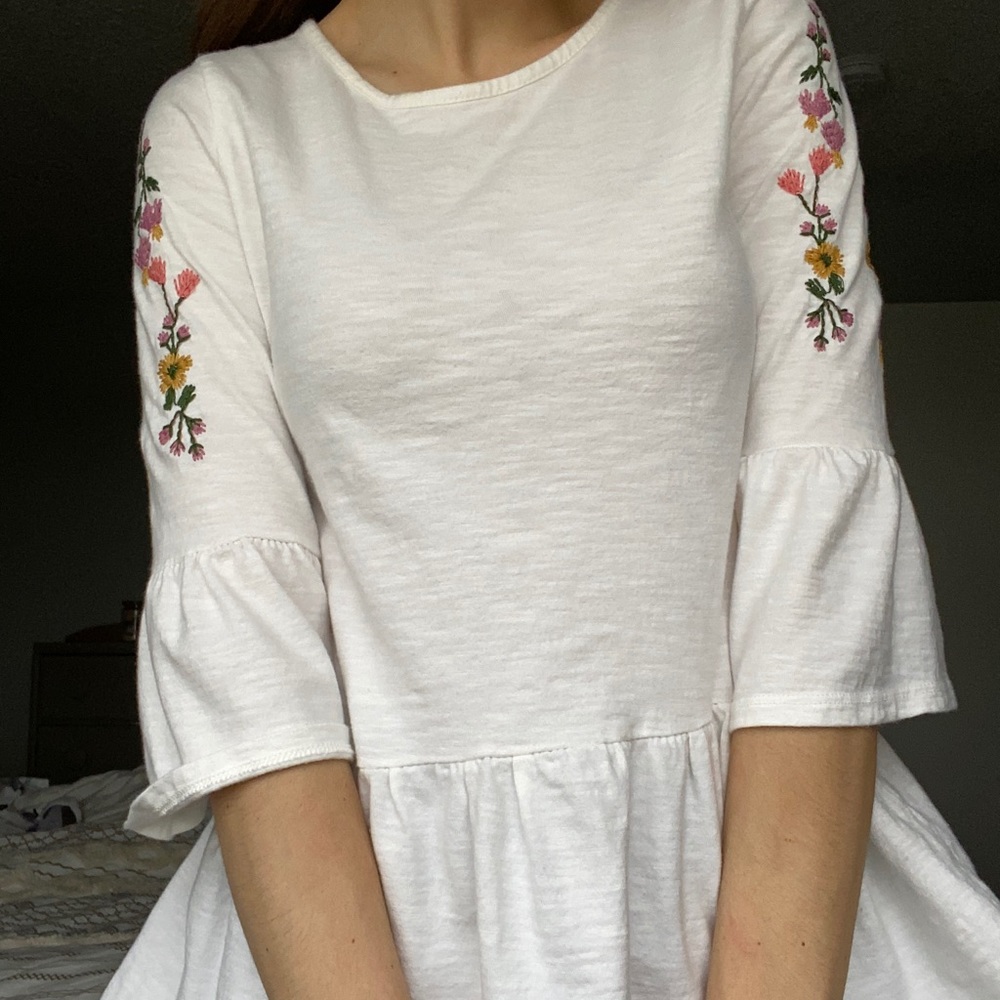 White peplum top